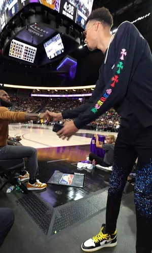 Victor Wembanyama’s Outfit in Chrome Hearts Top, Amiri Jeans & Nike Sneakers (2022)