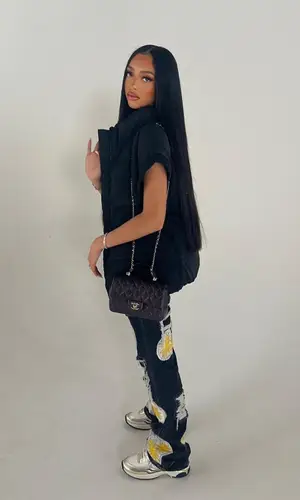 Jodie Woods wearing Who Decides War jeans