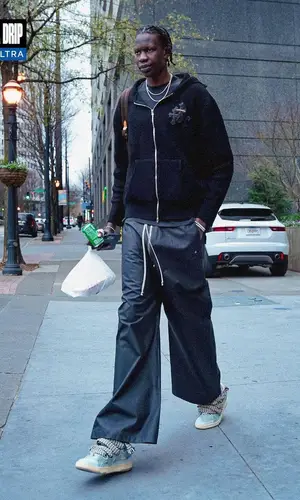 Bol Bol wearing Rick Owens pants
