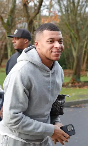 Kylian Mbappe wearing Nike pants