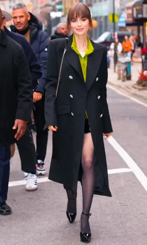 Lily Collins wearing Cartier jewelry