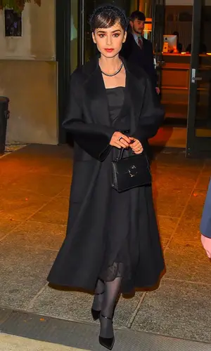 Lily Collins wearing Cartier jewelry