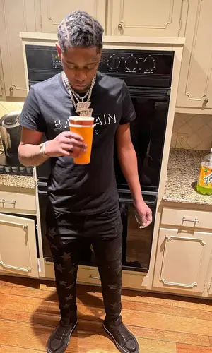 Big Scarr wearing Amiri jeans