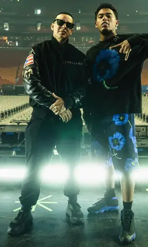 Myke Towers wearing Kenzo sweatshirt