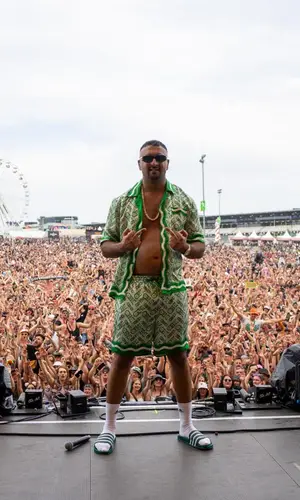 Ssio wearing Casablanca shorts