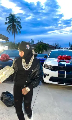 6ix9ine wearing Givenchy jacket