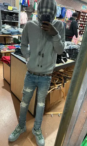Quando Rondo wearing Burberry hoody