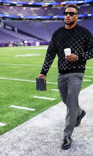 Saquon Barkley’s Outfit in Alexander McQueen Boots & Louis Vuitton Eyewear (2022)