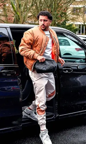 Marquinhos wearing Louis Vuitton bag