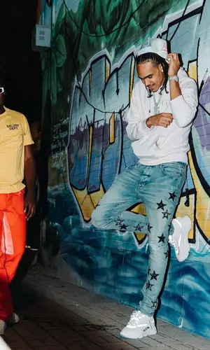 Dalano Banton wearing Amiri jeans