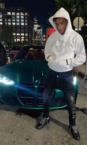 Dougie B wearing Spider Worldwide hoody