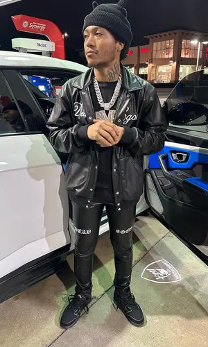 Lil Meech wearing Rta jacket