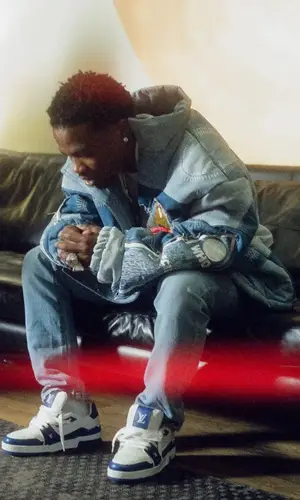 Roddy Ricch wearing Who Decides War jacket