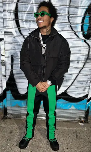 Lil Meech wearing Bottega Veneta boots