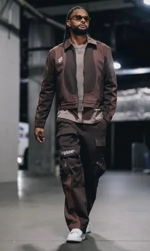 Patty Mills’ Outfit in Unseen Being Jacket & Alexander McQueen Sneakers (2022)