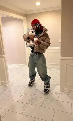 Lil Nas X’s Outfit in Balenciaga Jacket & Rick Owens Boots (2022)