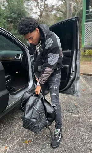 Nardo Wick wearing Amiri jeans