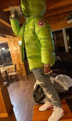 Finesse2tymes wearing Amiri jeans