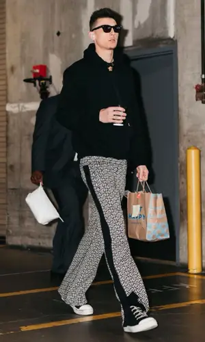 Tyler Herro’s Outfit in Versace Hoodie, Balmain Pants & Saint Laurent Eyewear (2023)