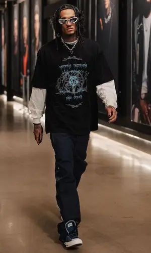 Jordan Clarkson’s Outfit in Vetements T-Shirt, Balenciaga Eyewear & Apple (2023)