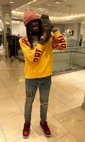 SleazyWorld Go wearing Supreme hat
