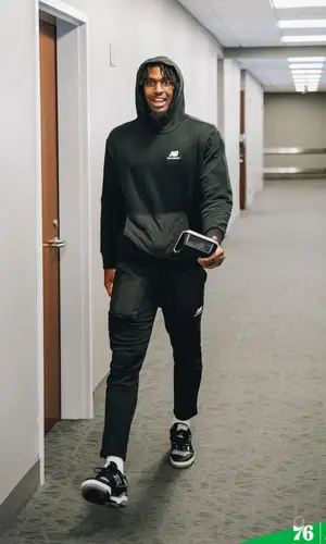 Tyrese Maxey wearing New Balance hoody