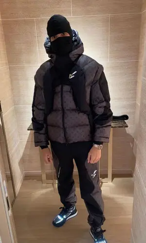 Meekz wearing Louis Vuitton sneakers