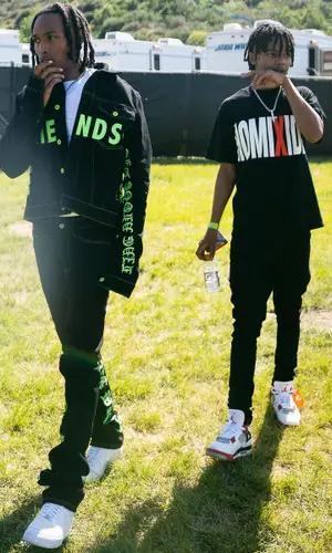 Homixide Meechie wearing Vlone jeans