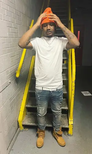 Homixide Beno! wearing Louis Vuitton belt