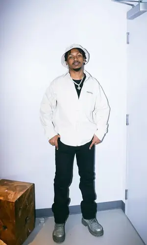 Homixide Beno! wearing Balenciaga shirt