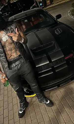 Money Man wearing Louis Vuitton belt
