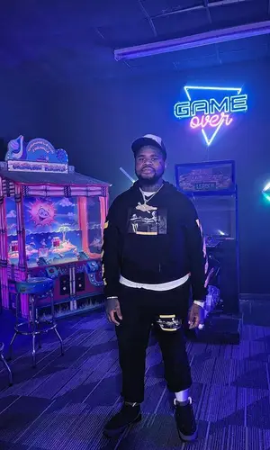 Fat Boy wearing Off-White hoody