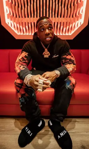 BandMan Kevo wearing Amiri pants