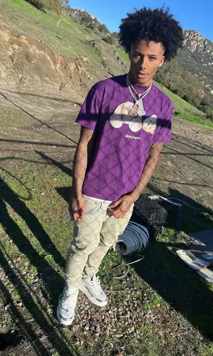 Mikey wearing Louis Vuitton belt