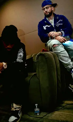 DJ Drama’s Outfit in Saint Michael Jacket, Tom Ford Eyewear & Louis Vuitton Cap (2023)