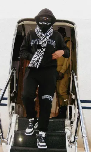 Lil Baby wearing Givenchy scarf