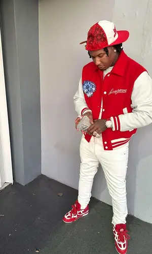 Moneybagg Yo wearing Louis Vuitton cap