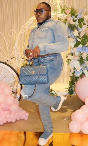 Saucy Santana wearing Amiri jeans