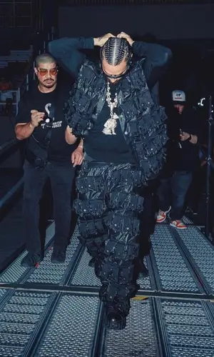 Maluma’s Outfit in Marc Jacques Burton Jacket, Nike Eyewear & Overwatch 2 (2023)