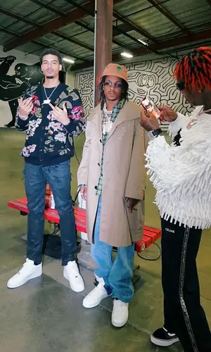 Rich The Kid wearing Celine shirt