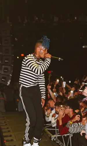 XXXTentacion’s Outfit in Adidas Pants, No Name Jewelry & Obey Socks (2019)