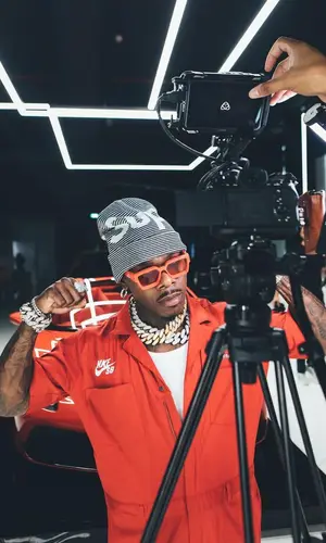 DaBaby wearing Supreme hat