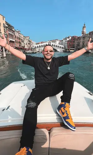 Rocco Hunt wearing Amiri jeans