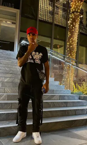 Silky wearing Amiri cap
