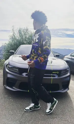 Mikey wearing Bape hoody
