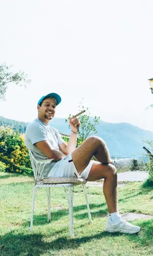 PLK wearing The North Face cap