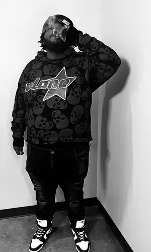 Biggaveli wearing Vlone hoody