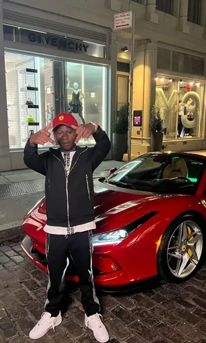 Bouba Savage’s Outfit in Givenchy Pants, Puma Cap & Ferrari (2022)