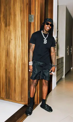 Polo G wearing Louis Vuitton hat