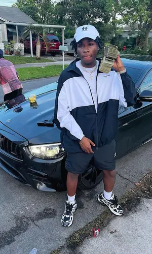 Guapo wearing Balenciaga cap